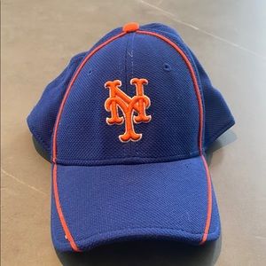 A lightly worn NY Mets hat